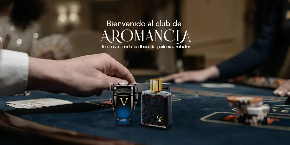 Botella de perfume negra y plateada con tapón de cristal azul, inspirada en el diseño de Lalique.